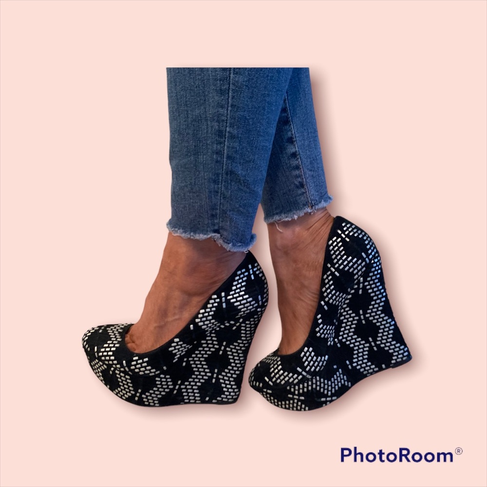 Alexandre Birman black platform wedge pumps. Silver metallic detailing.